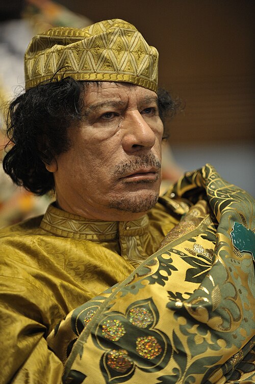 Muammar Gaddafi†